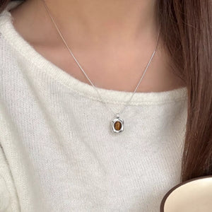Tiger' necklace in brown with delicate silhouette