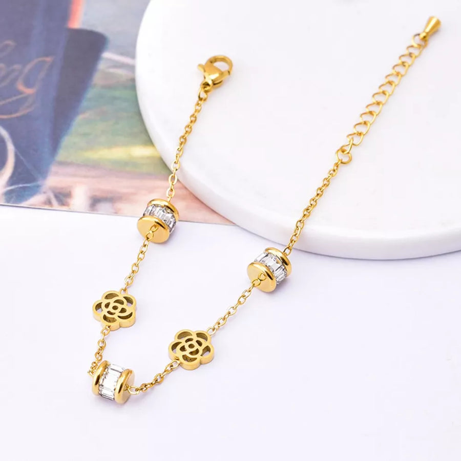 clear bracelet featuring flower charms and floral