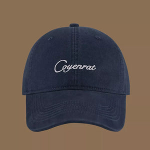 Navy baseball cap with white embroidered text.