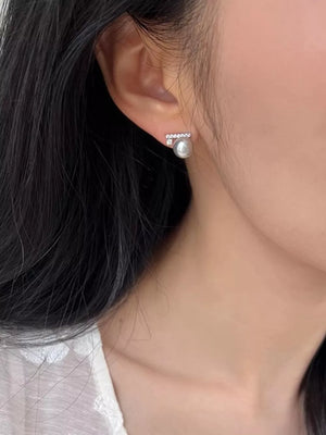Zircon pearl stud earrings with a bar of small stones.