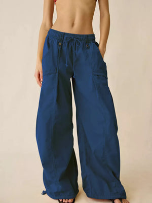 100% polyester Care instructions: Machine wash cold cargo pants in Army Green with wide-leg silhouette