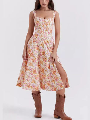 Floral midi dress with side slit, sweetheart neckline, and corset bodice.