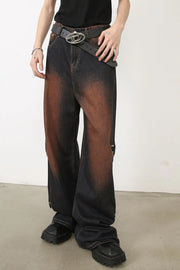 Dark wash palazzo jeans with faded brown accents and stud details.