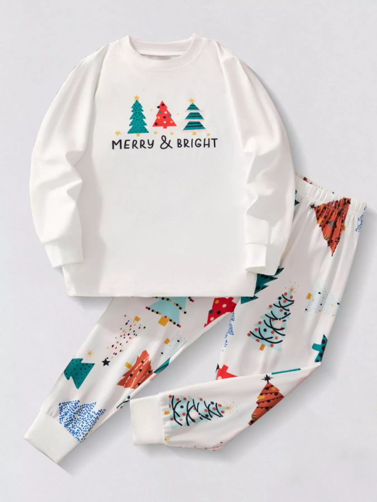 White children's long-sleeve pajamas with Merry & Bright tree print and all-over Christmas tree pattern.
