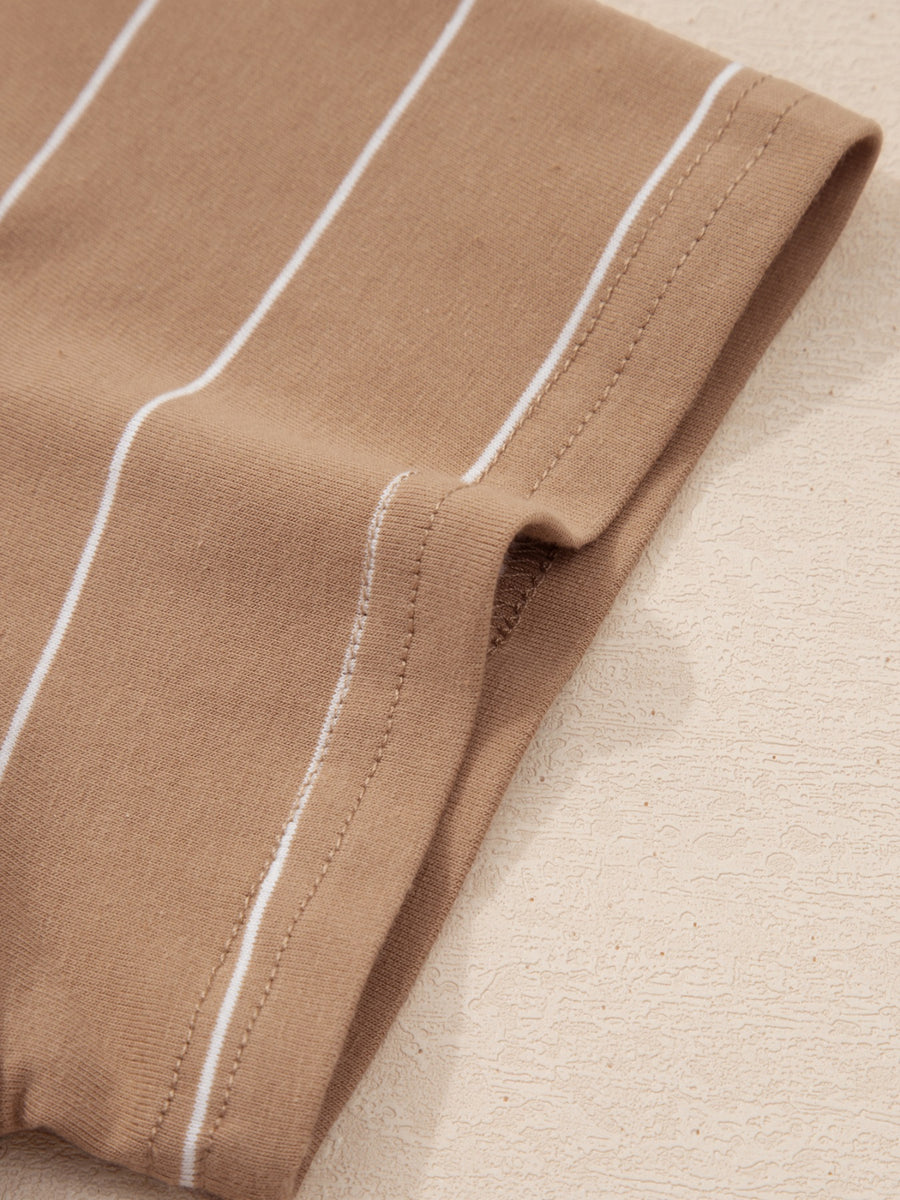 Brown striped t-shirt dress with white pinstripes and a rolled sleeve detail.