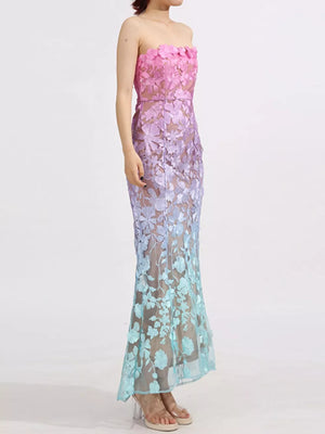Strapless floral lace gown with ombre pink to blue gradient and mermaid silhouette.