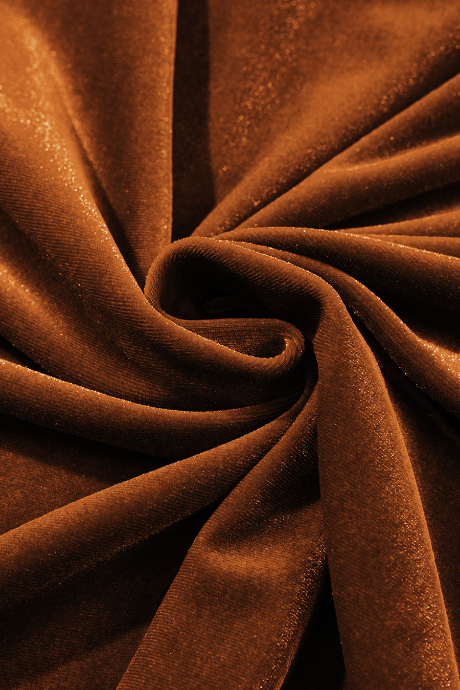 Brown velvet blouse with gathered sleeves and subtle shimmer detail.