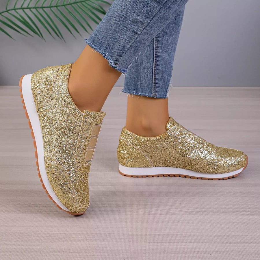 Gold glitter slip-on flats with round toe and white sole