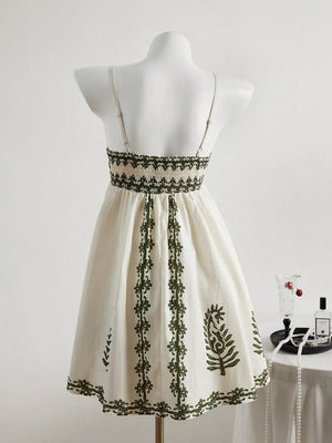 mini dress in Apricot with botanical-print and smocked