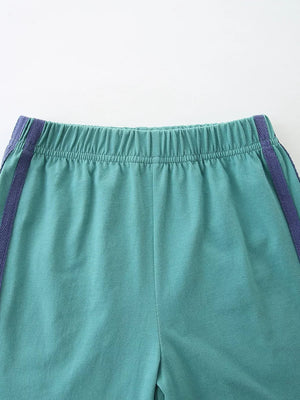 Teal cotton shorts with elastic waistband and purple striped trim