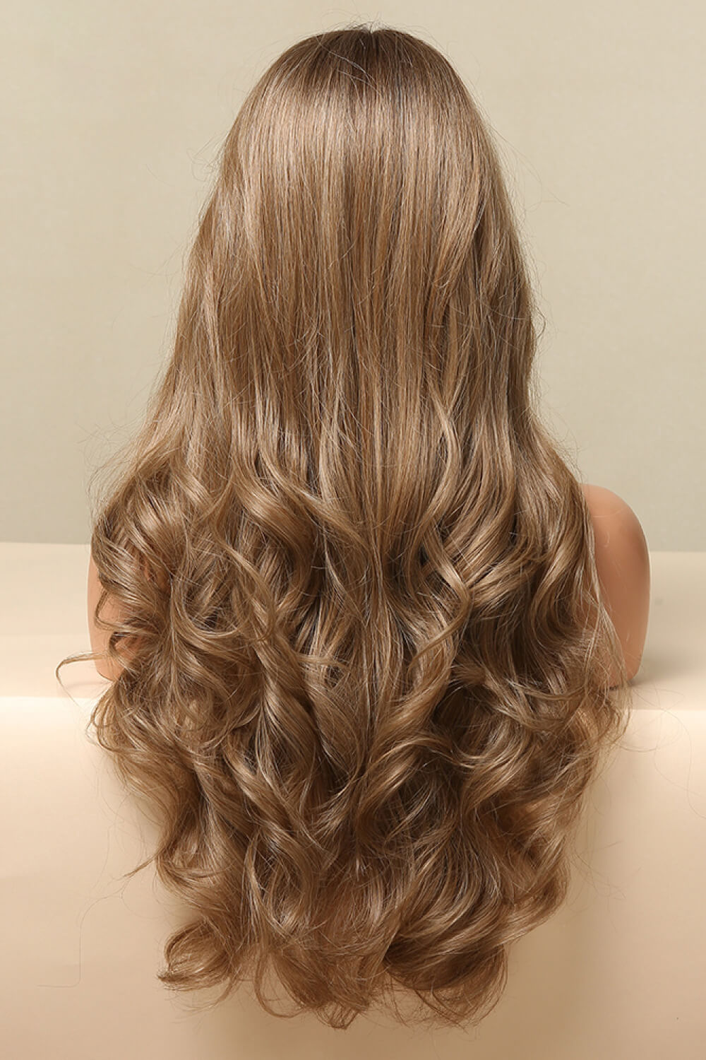 Luxe Cascading Wave Lace Front Wig in Golden Brown with loose curls.