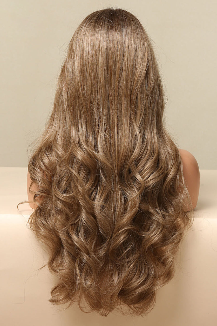Luxe Cascading Wave Lace Front Wig in Golden Brown with loose curls.