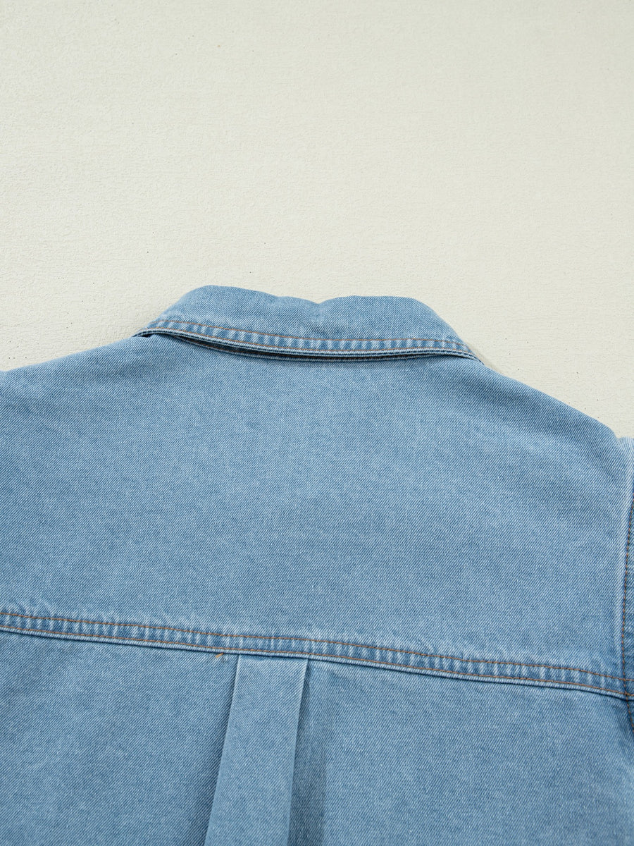 Light blue denim button-down shirt with collar and back pleat detail