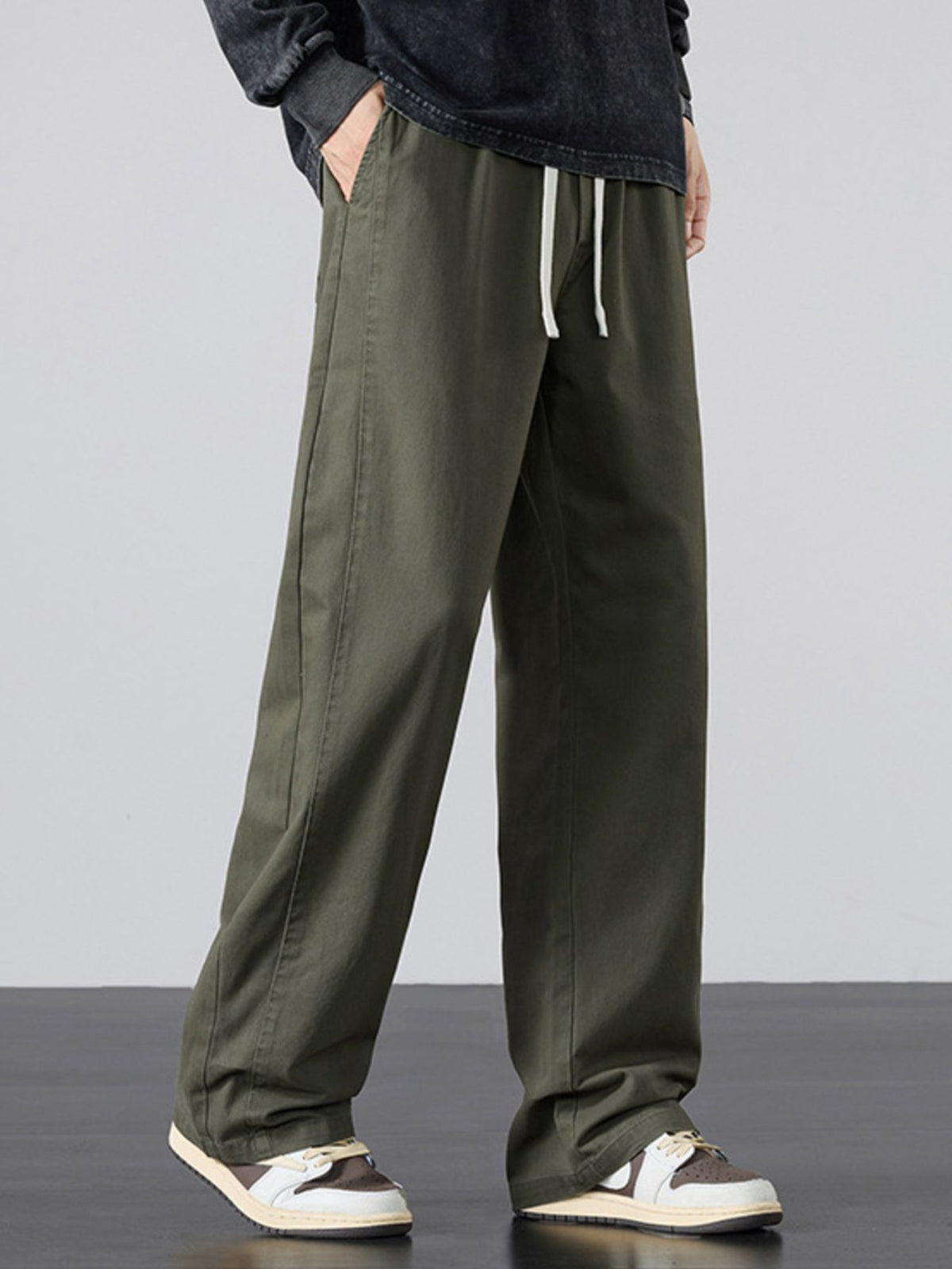 95%polyester,5%spandex Care instructions: Machine wash cold wide-leg pants in Black with loose silhouette