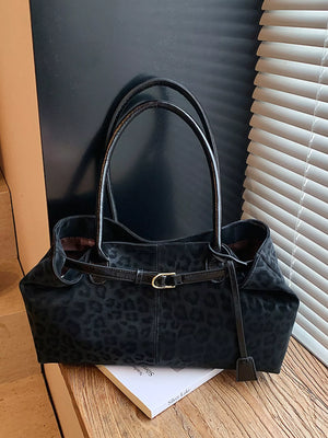 Black leopard print PU leather shoulder bag with gold buckle detail