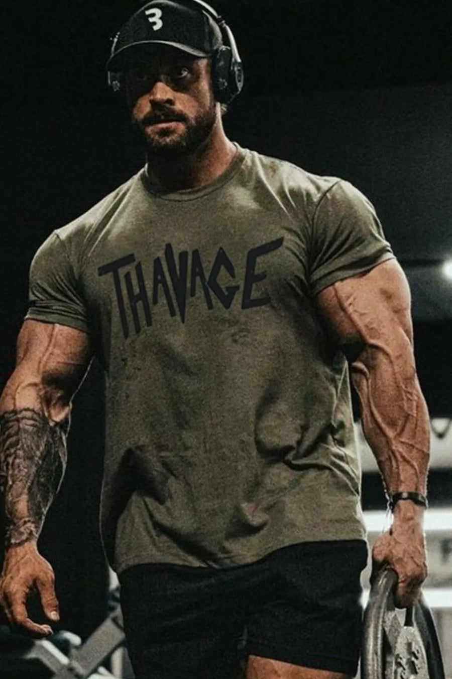 Savage graphic oversized tee in moss green with black text, crew neck, short sleeves.