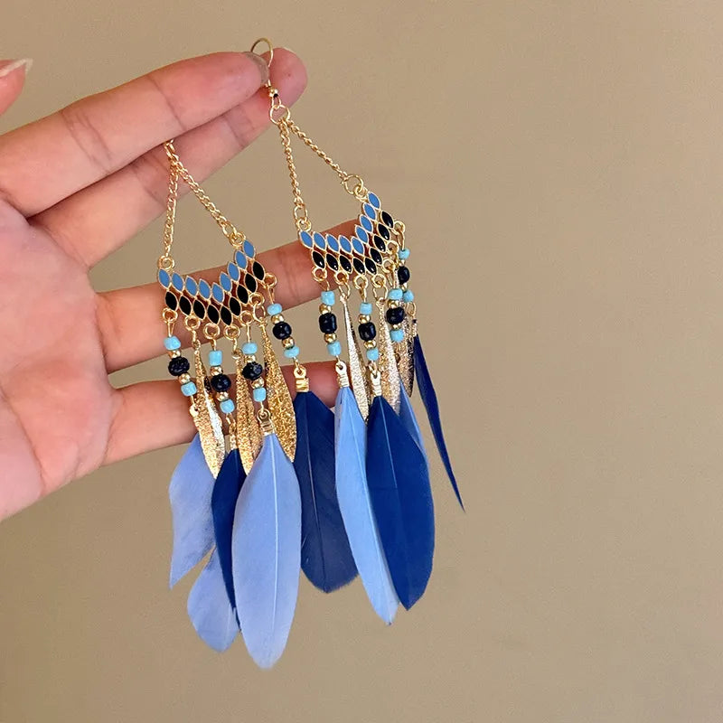 Blue feathered cascade earrings with enamel and bead details