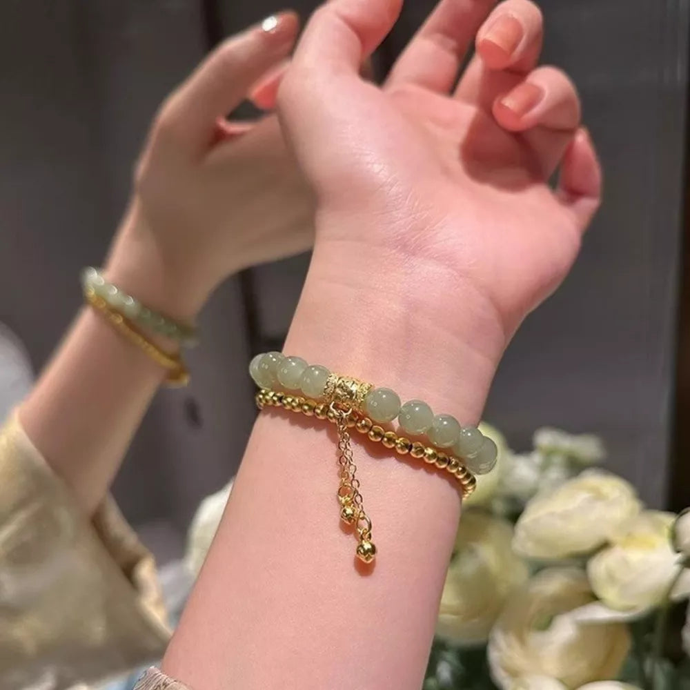 18k gold-plated bead bracelet with green jade beads and gold chain detail