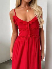 Red ruffled midi dress with spaghetti straps and tie-front neckline