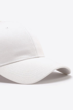 White cotton twill baseball cap with curved brim and stitched details