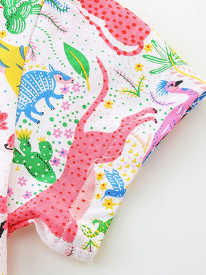 Baby dress with colorful animal and plant print, short sleeves, cotton blend fabric.
