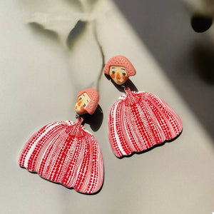Red and white polka dot pumpkin dangle earrings with pink hair girl faces.
