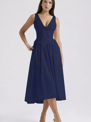 Navy v-neck midi dress with a-line skirt and ruched bodice detail