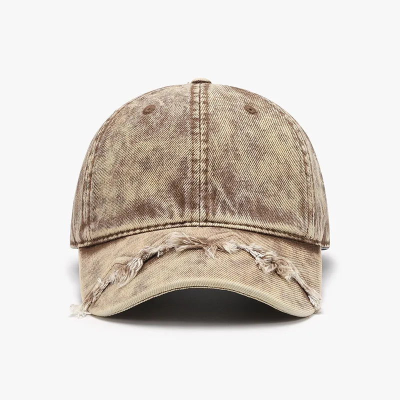 Tan acid wash distressed baseball cap with frayed brim detail