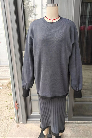 100% polyester Care instructions: Machine wash cold Sweater and Skirt Set in Dusty Blue with relaxed silhouette