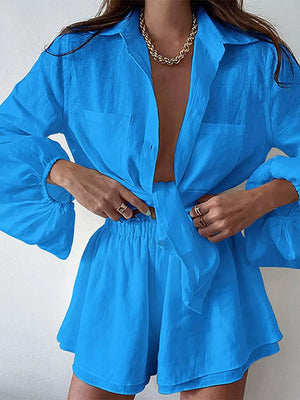 Sky blue two-piece set with a tie-front shirt and elastic waist shorts.