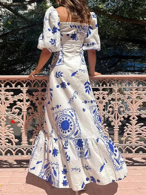 maxi dress in White with floral and puff sleeve