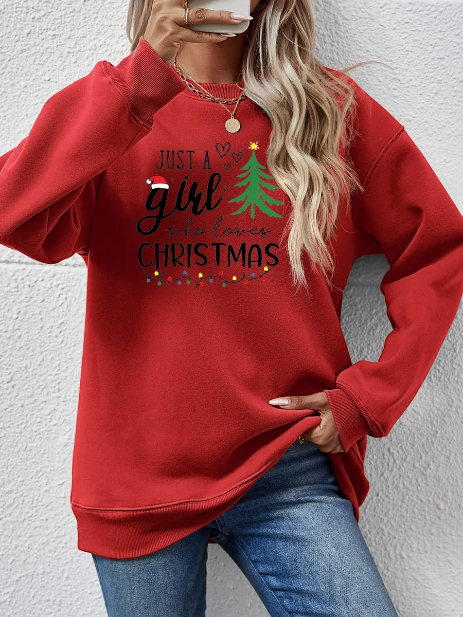 Deep Red sweatshirt with "Just a girl who loves Christmas" graphic and Christmas lights.