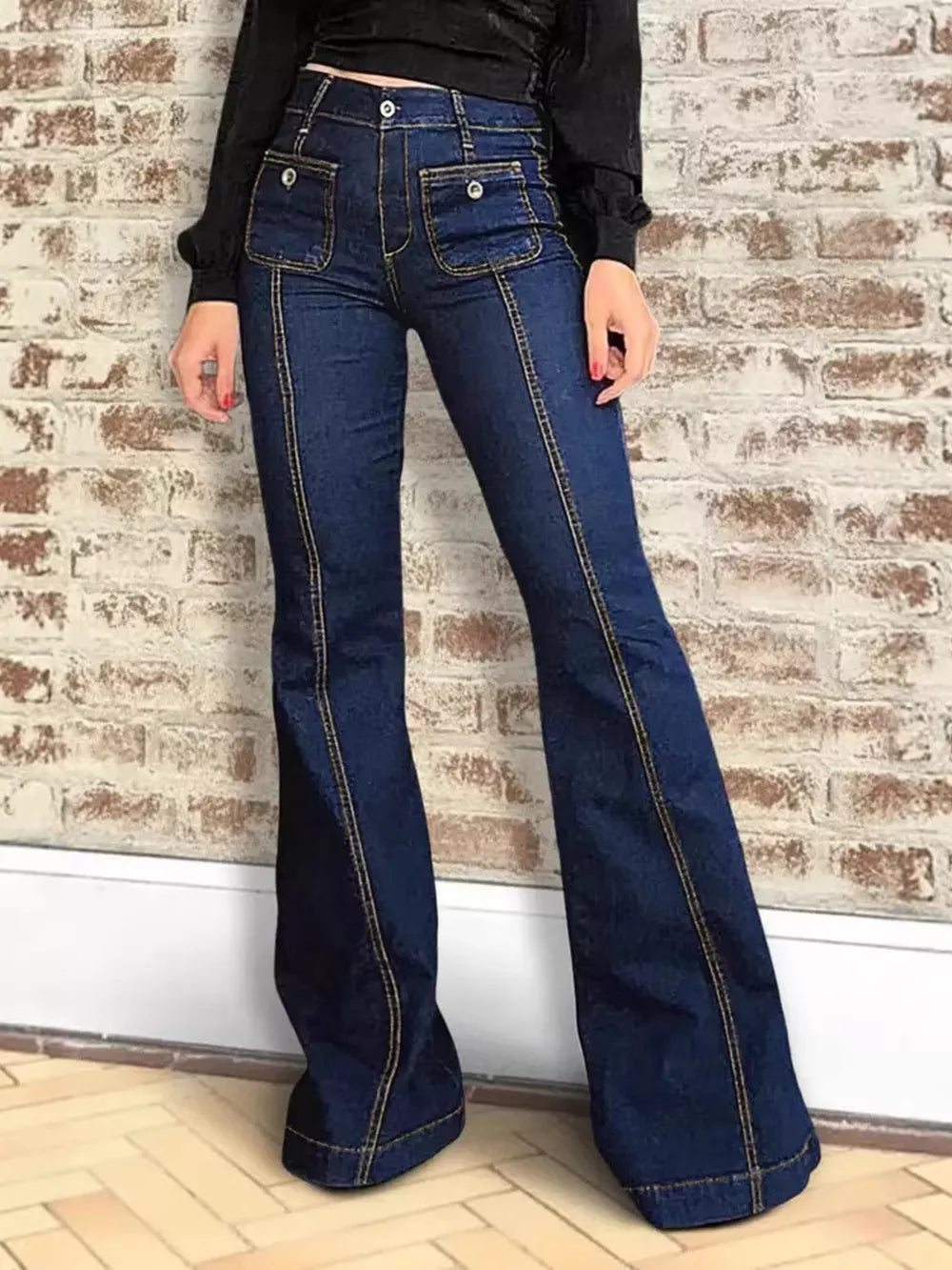 Chic high-rise flare jeans in dark wash denim with contrast stitching and front pockets.