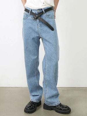 Light blue relaxed-fit denim jeans with subtle seam detail and a black belt.