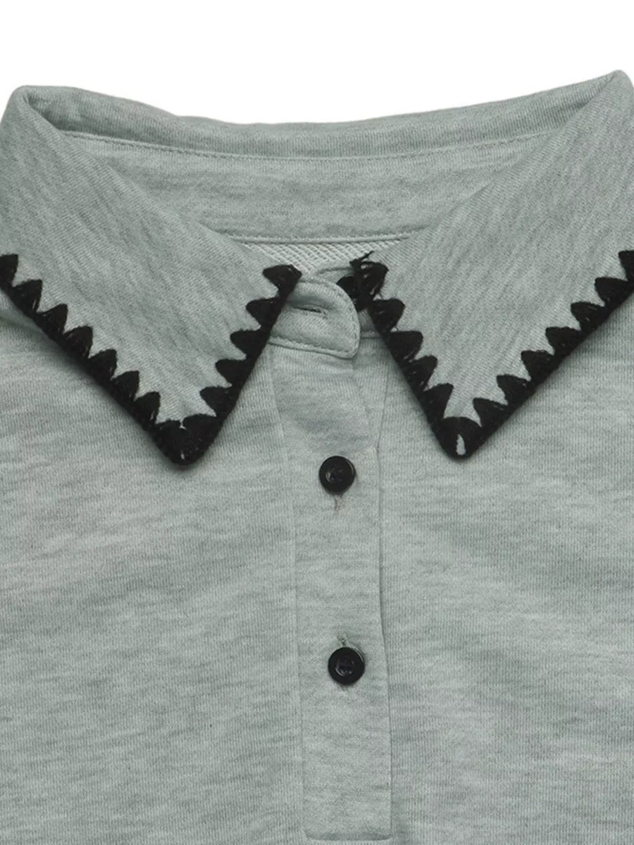 light grey sweatshirt with dropped shoulder and long sleeve