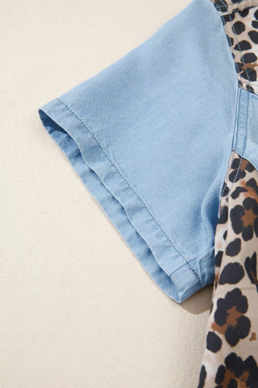Denim shirt with short sleeves and leopard print paneling