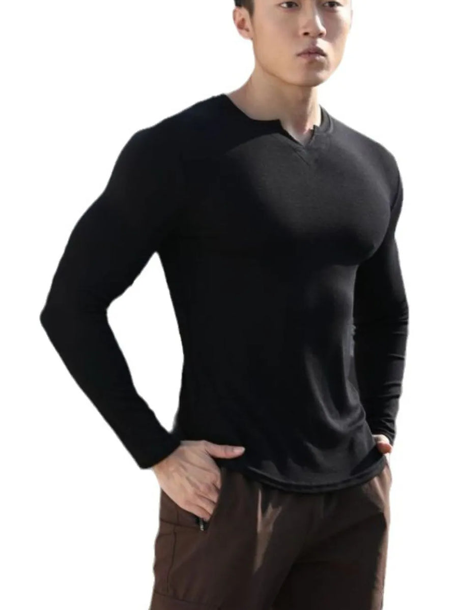 Black ribbed long sleeve t-shirt with a sculpted V-neck detail.