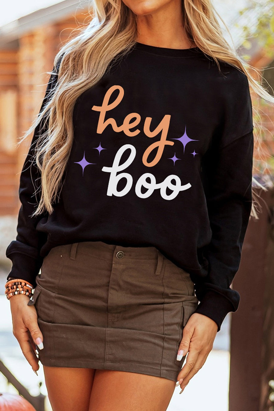 sweatshirt in light orange with graphic-print and ribbed cuffs