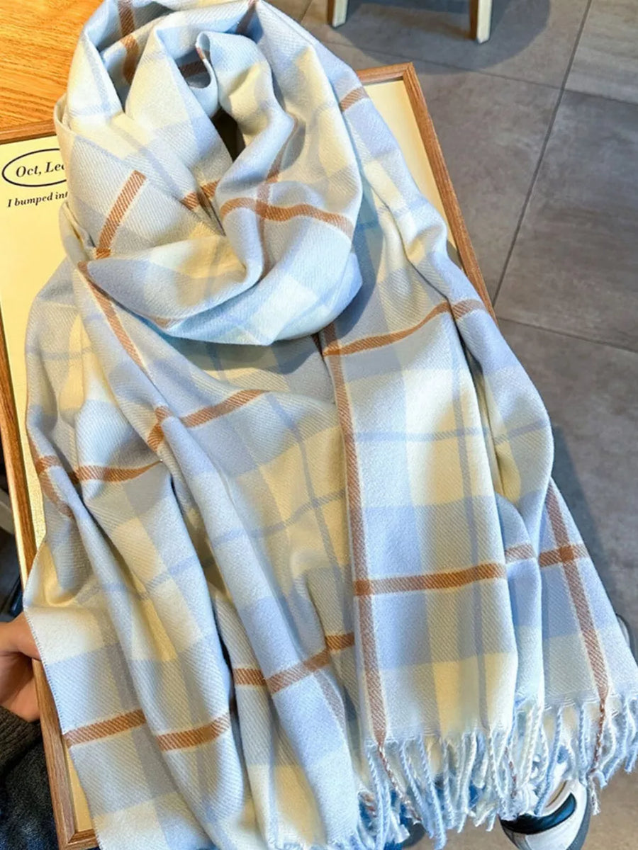 Sky blue plaid fringe scarf with tan and white accents.