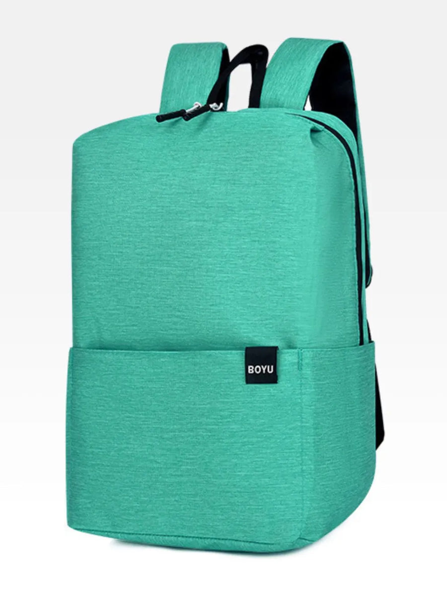 Textured aqua school backpack with minimalist design and black trim.