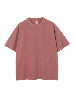 Oversized washed cotton tee in rust with relaxed fit and crewneck.