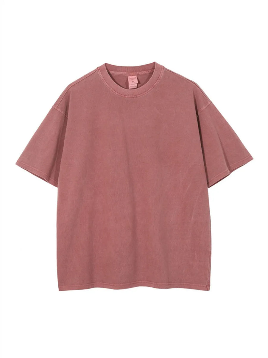 Oversized washed cotton tee in rust with relaxed fit and crewneck.