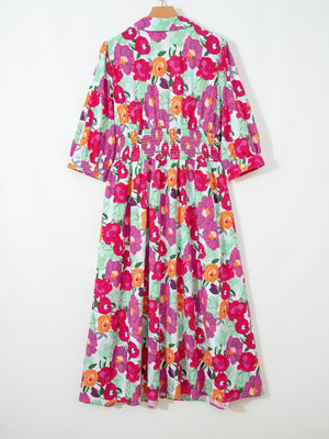 Floral V-neck cotton midi dress with smocked waist and 3/4 sleeves.