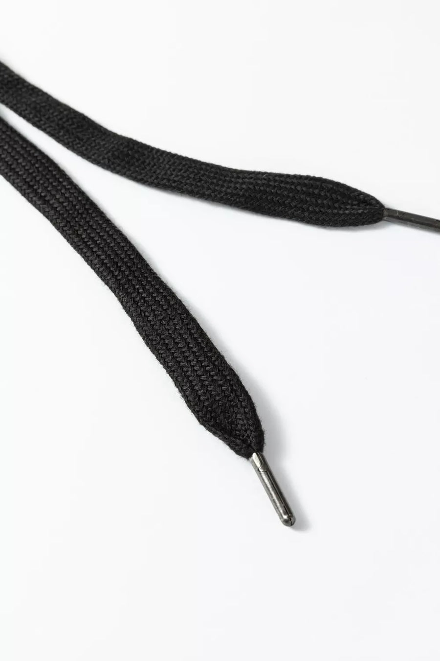 Black drawstring with metal tips from loungewear set.
