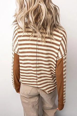 95% polyester, 5% elastane Care instructions: Machine wash cold pullover sweater in brown with relaxed silhouette