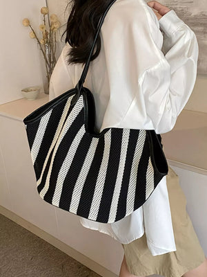 handbag in Black with striped and knit texture