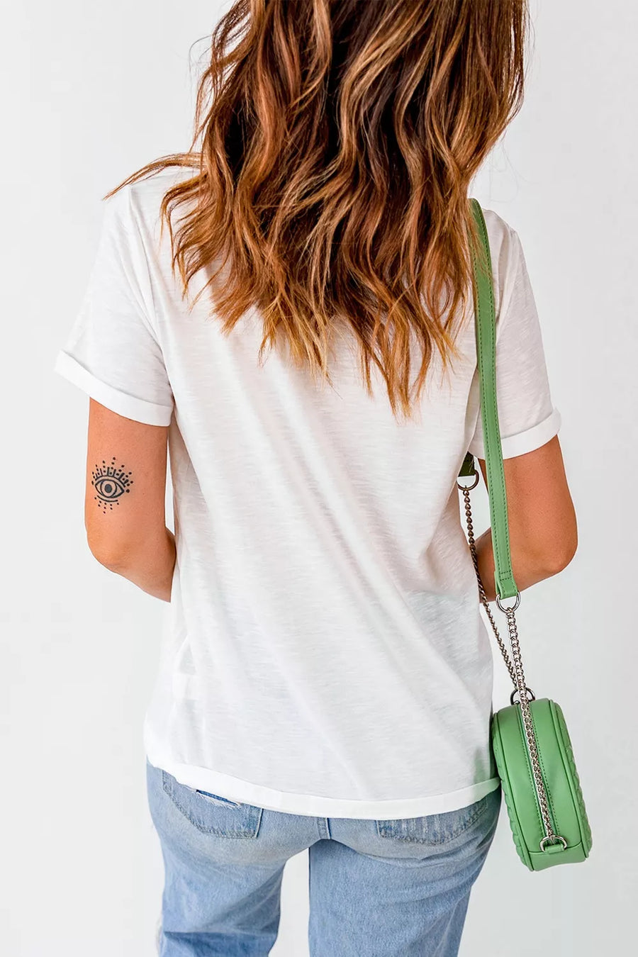 White t-shirt featuring oversized and graphic-print
