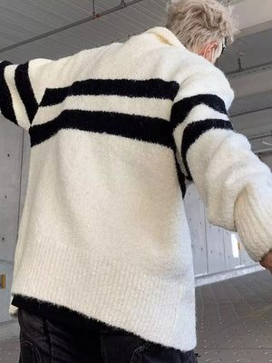 Full-size striped knit button-down cardigan in black and apricot with a relaxed fit.