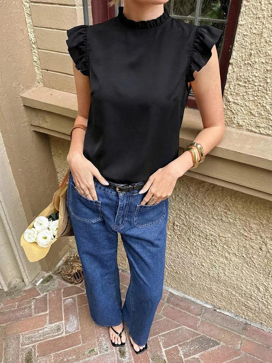 Black cap sleeve blouse with ruffled mock neck and cap sleeves.
