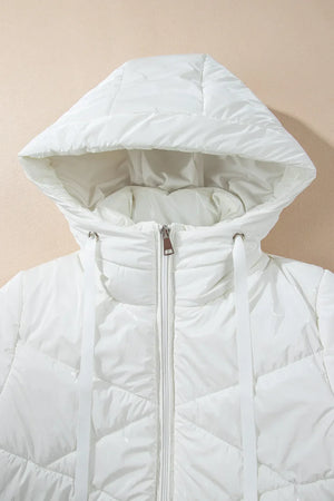 White glossy quilted hooded puffer jacket with a zipper and drawstring hood.